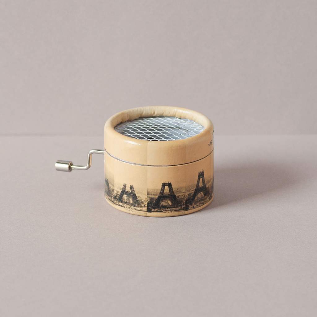 Mini round music box with the Eiffel Tower of Paris