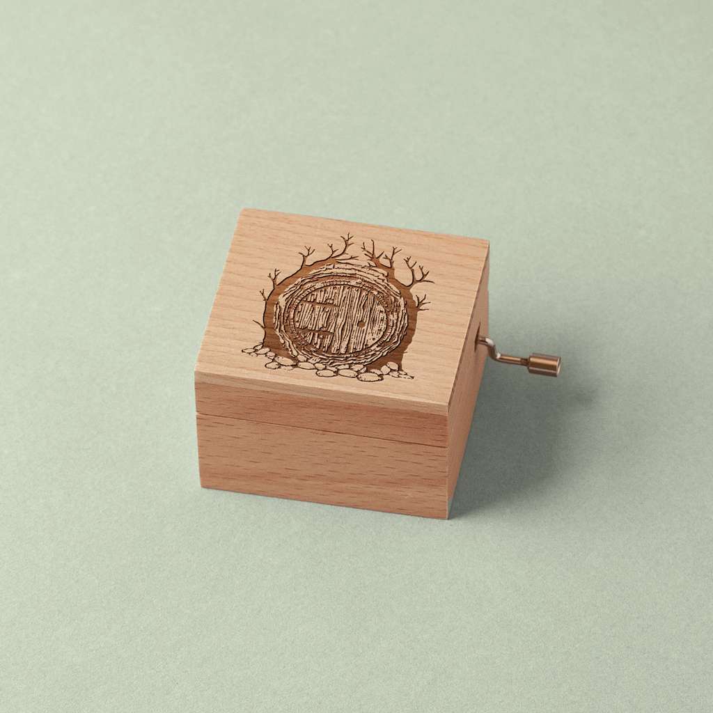 Music box with the Hobbits house engraved on it