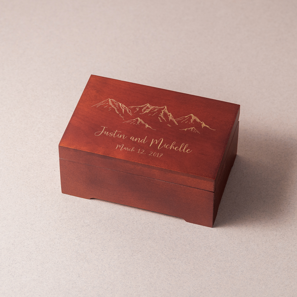 Medium size music box with mountains and a custom text